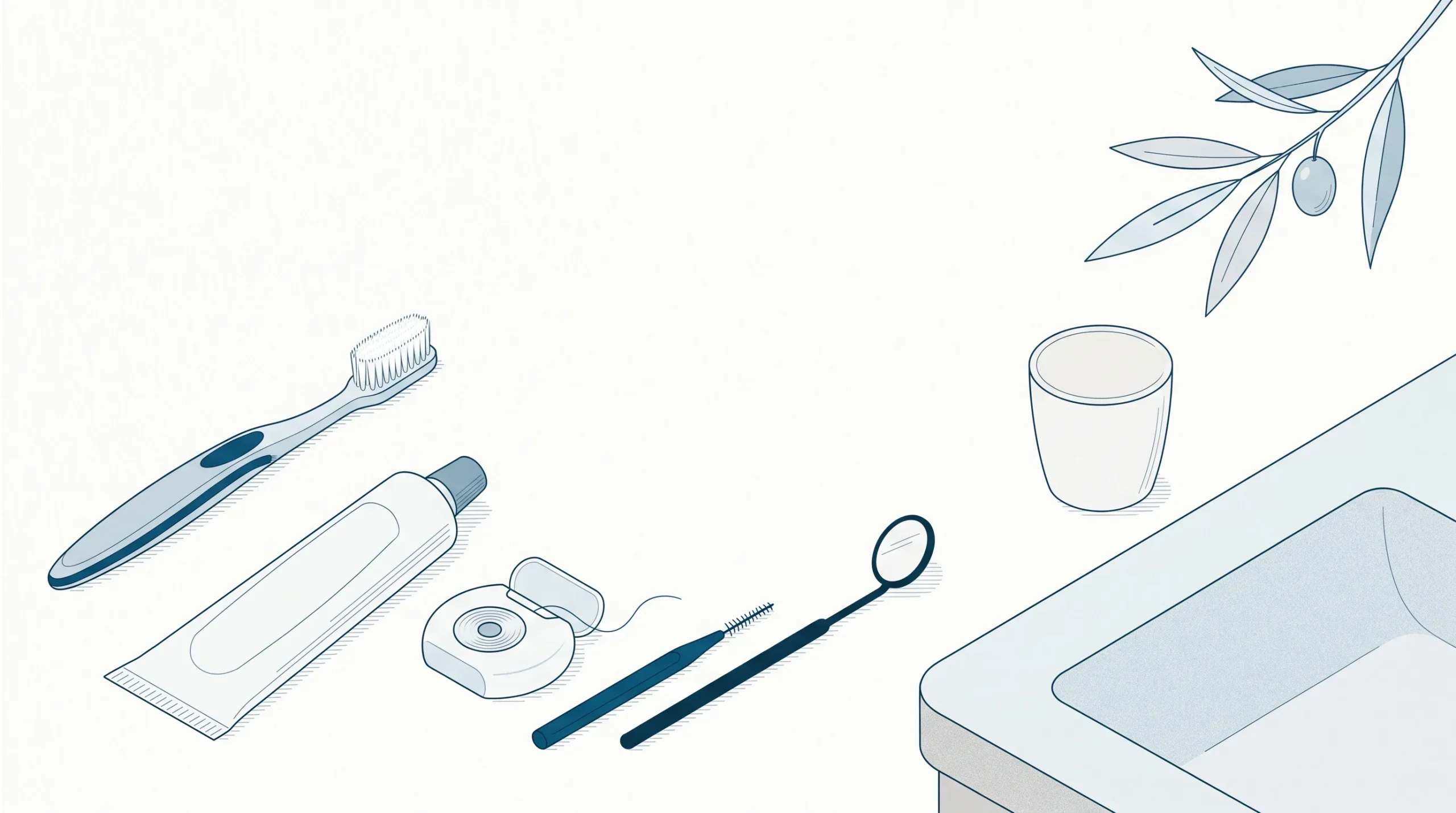 A toothbrush, floss and interdental brush sit beside a toothpaste tube and dental mirror on a tidy bathroom counter for everyday smile dental care.